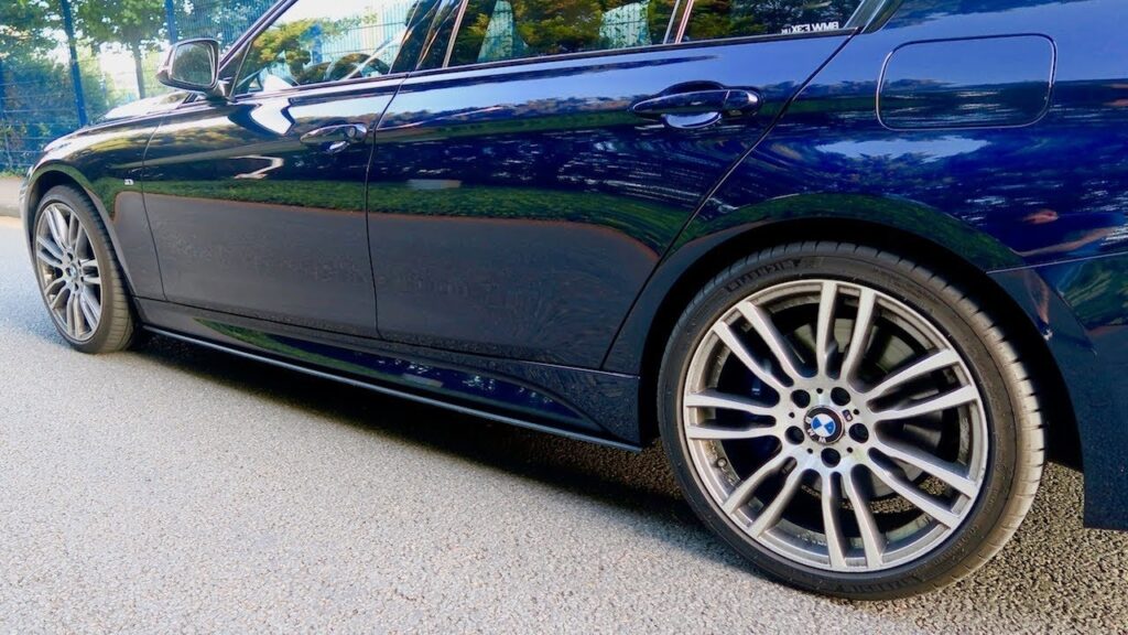 bmw f30 m-sport with a carbon fiber side skirt