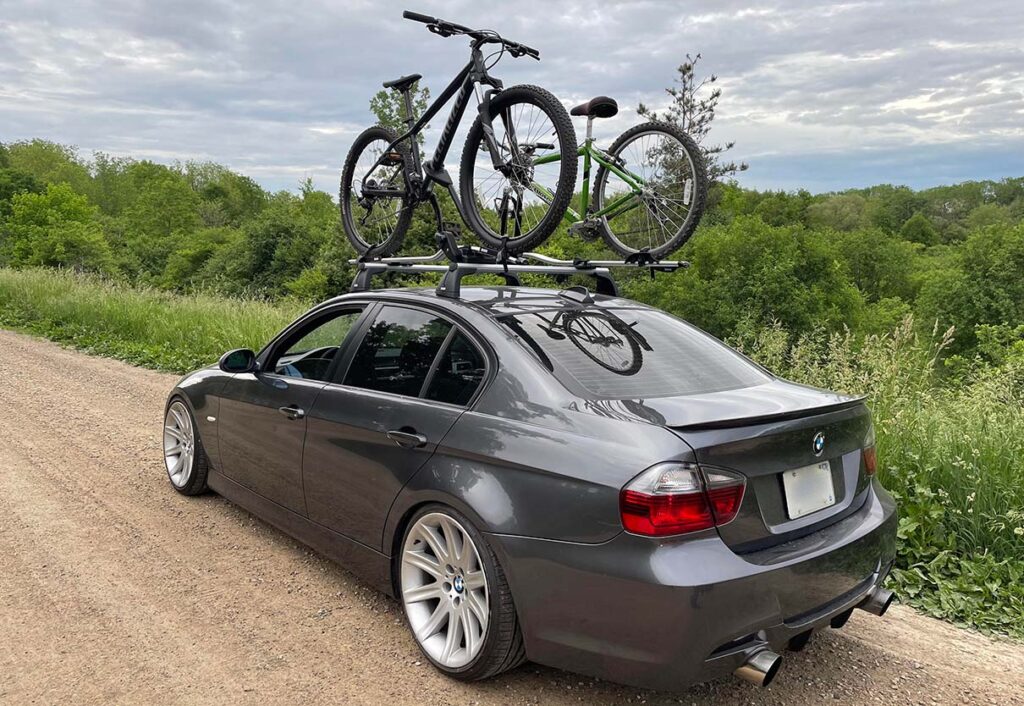 E90 335i carrying two bikes on roof rack